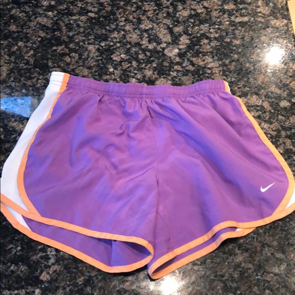 Purple and orange Nike shorts
